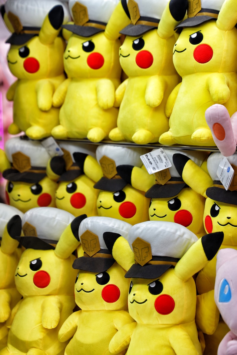 A bunch of stuffed animals that are on a shelf